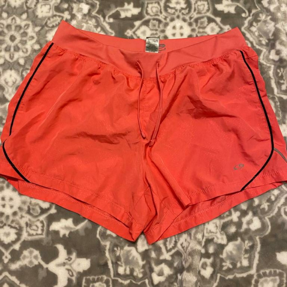 Champion orange shorts.